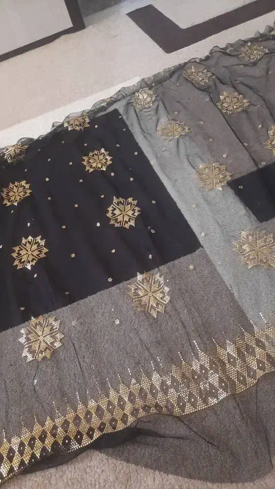 لباس قسطی|لباس|میناب, |دیوار