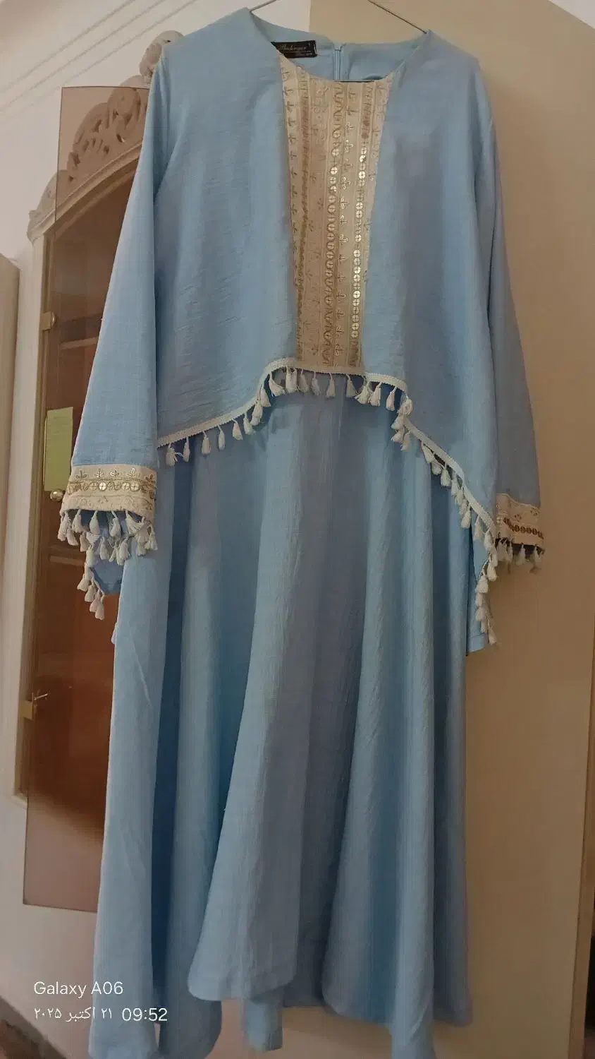 تعدادی لباس|لباس|قم, باجک یک|دیوار