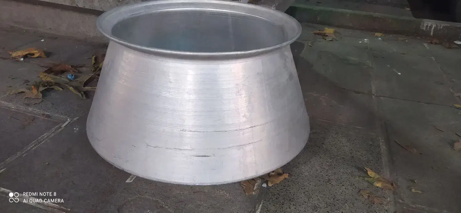 قابلمه روی یک من|ظروف پخت‌وپز|گرگان, |دیوار