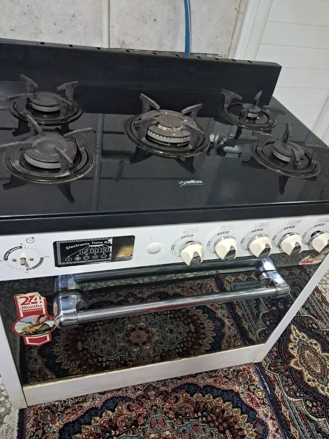 اجاق گاز پنج شعله صفحه شیشه‌ای سالم|اجاق گاز و لوازم برقی پخت‌وپز|کرج, حصارک پایین|دیوار