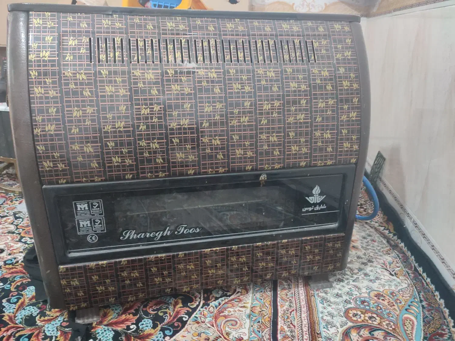 بخاری شارق طوس 9000|بخاری، هیتر، شومینه|خرم بید, |دیوار