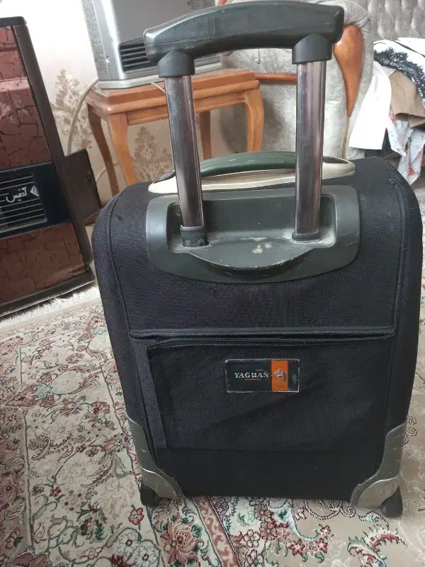 چمدان|کیف، کفش، کمربند|مشهد, کوشش|دیوار