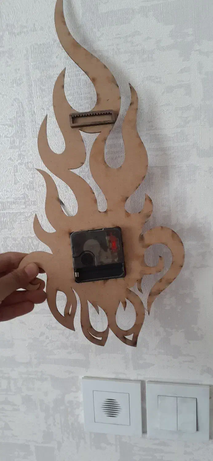 ساعت دیواری طرح شعله|ساعت دیواری و تزئینی|مشهد, کارمندان دوم|دیوار