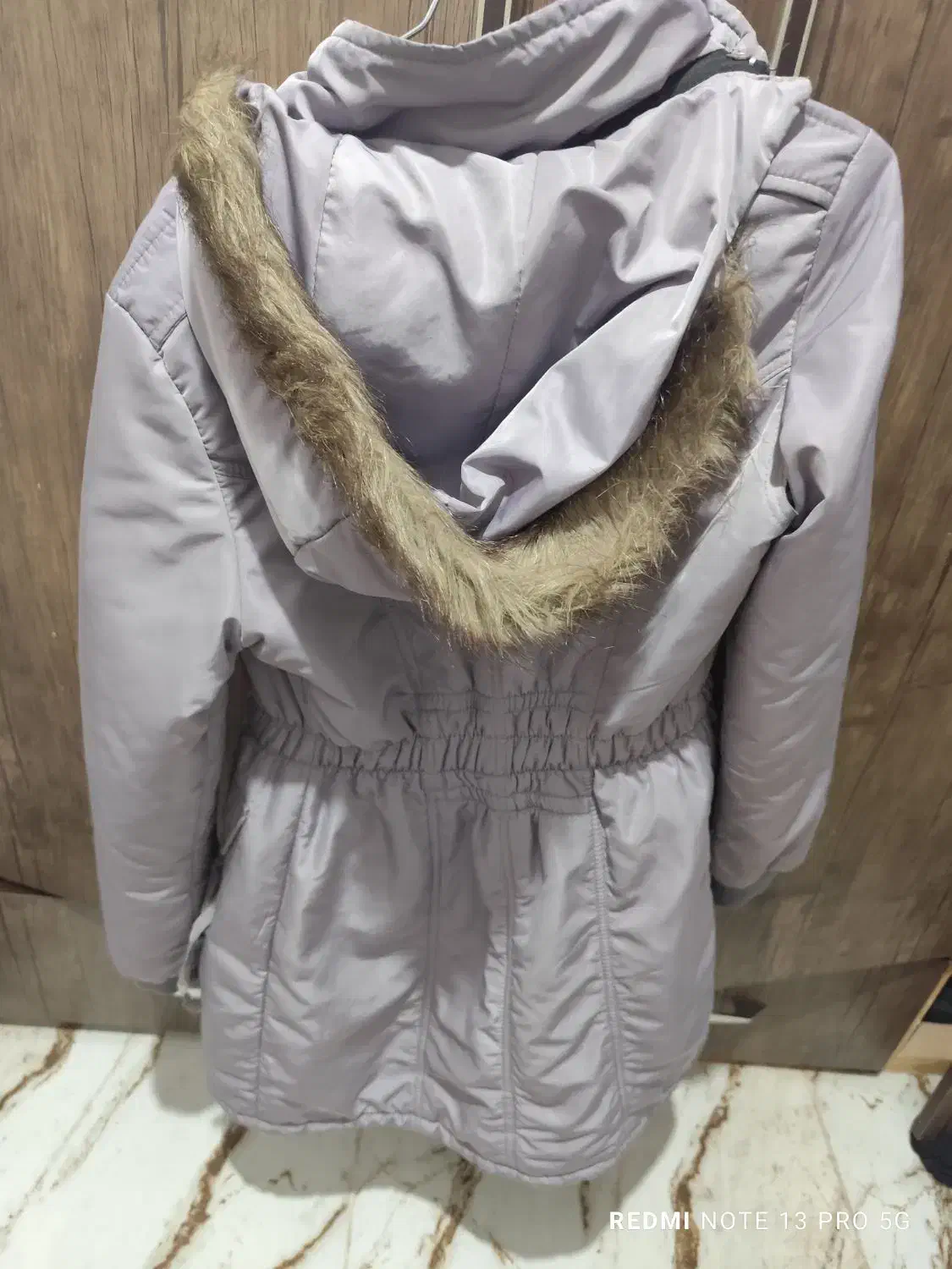 کاپشن|لباس|رشت, کوی حسینی|دیوار