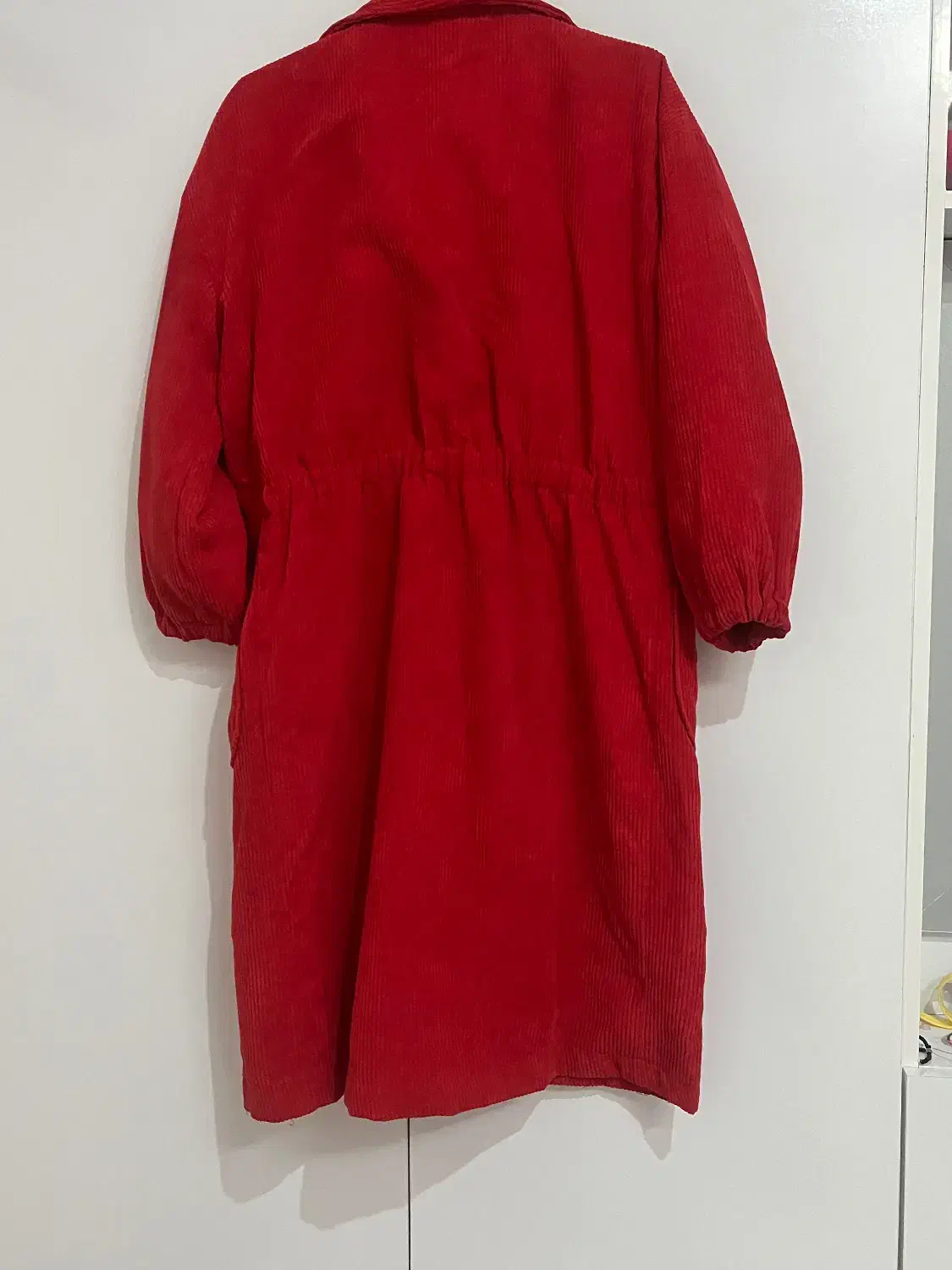 پالتو بلند|لباس|شاهین‌شهر, حافظ جنوبی|دیوار