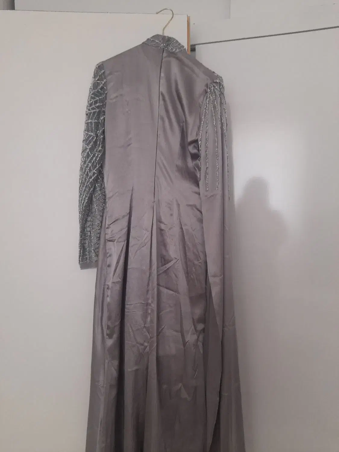 لباس بلند|لباس|تربت جام, والفجر|دیوار