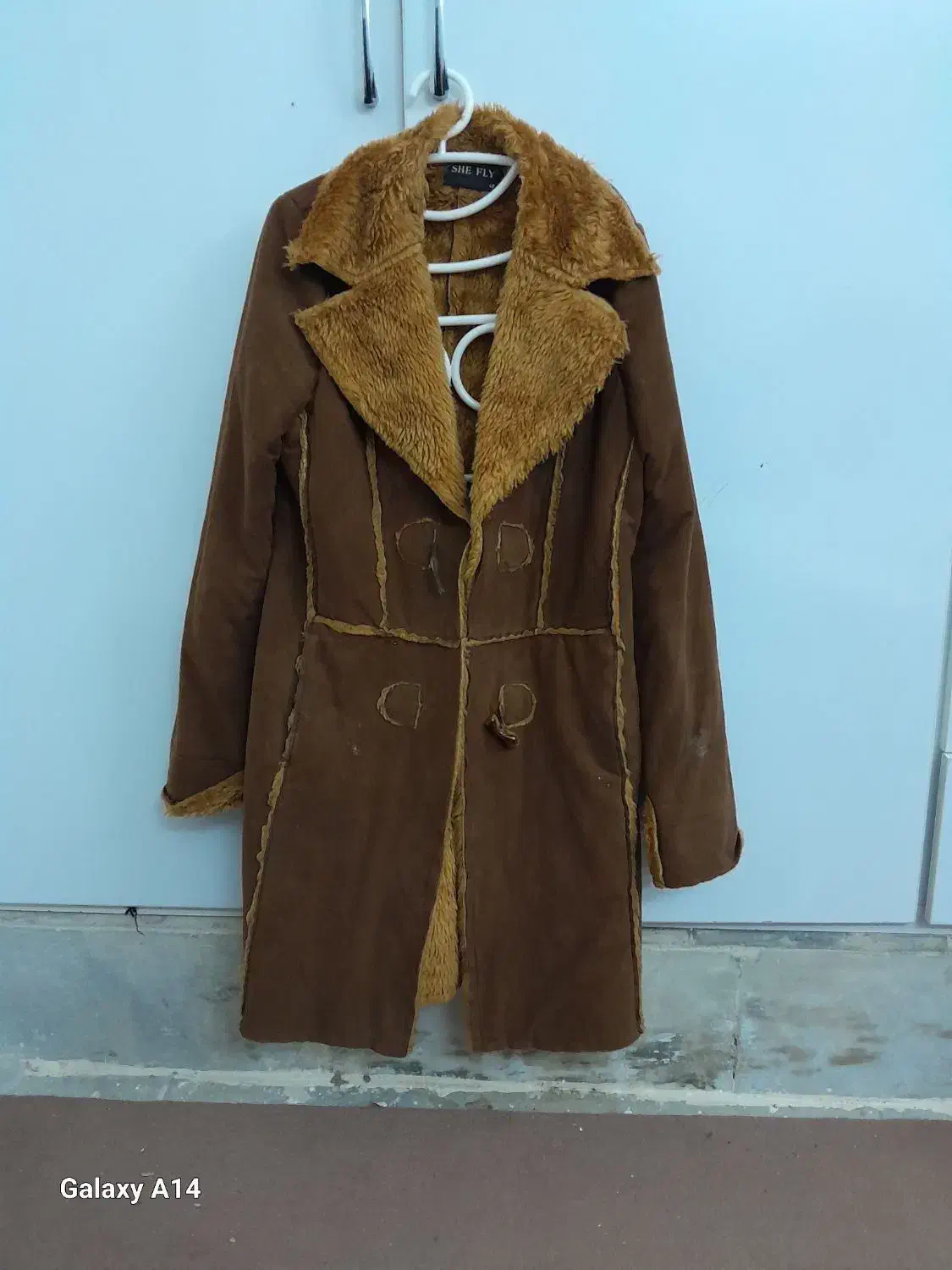 پالتو شتری|لباس|جهرم, |دیوار