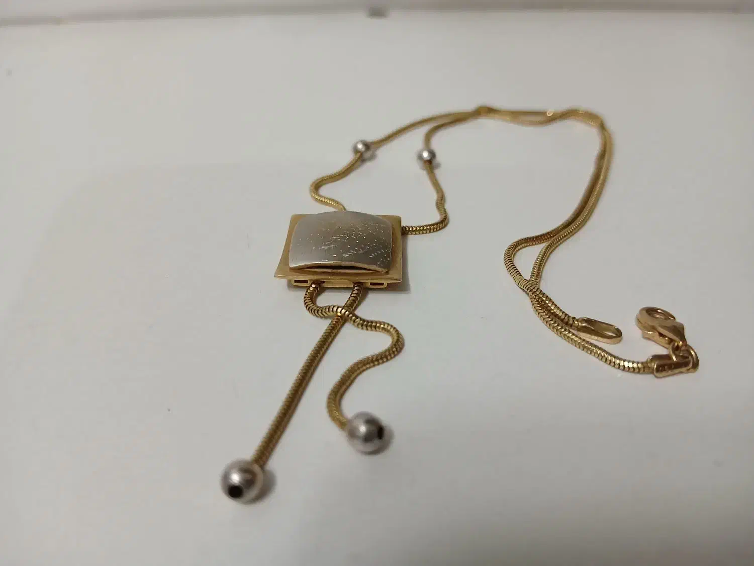 طلا|جواهرات|قم, هفت تیر|دیوار