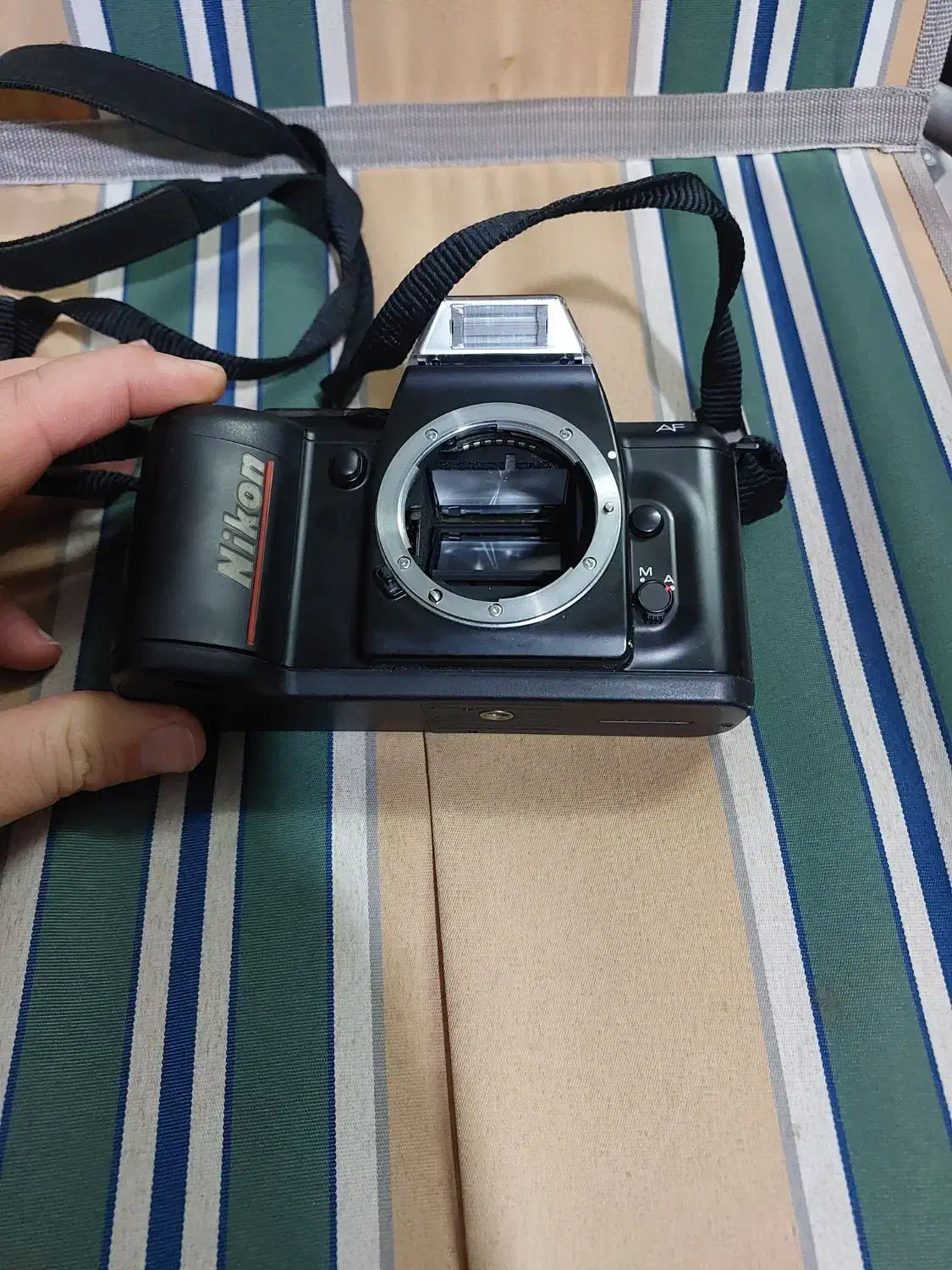 دوربین نیکون ژاپنی|دوربین عکاسی و فیلمبرداری|اندیشه, اندیشه فاز ۱|دیوار