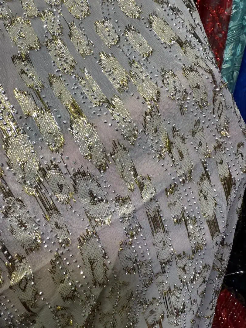 پارچه زره مثقال ونازنان وحریرهای سنگدار|لباس|مهاباد (آذربایجان غربی), |دیوار