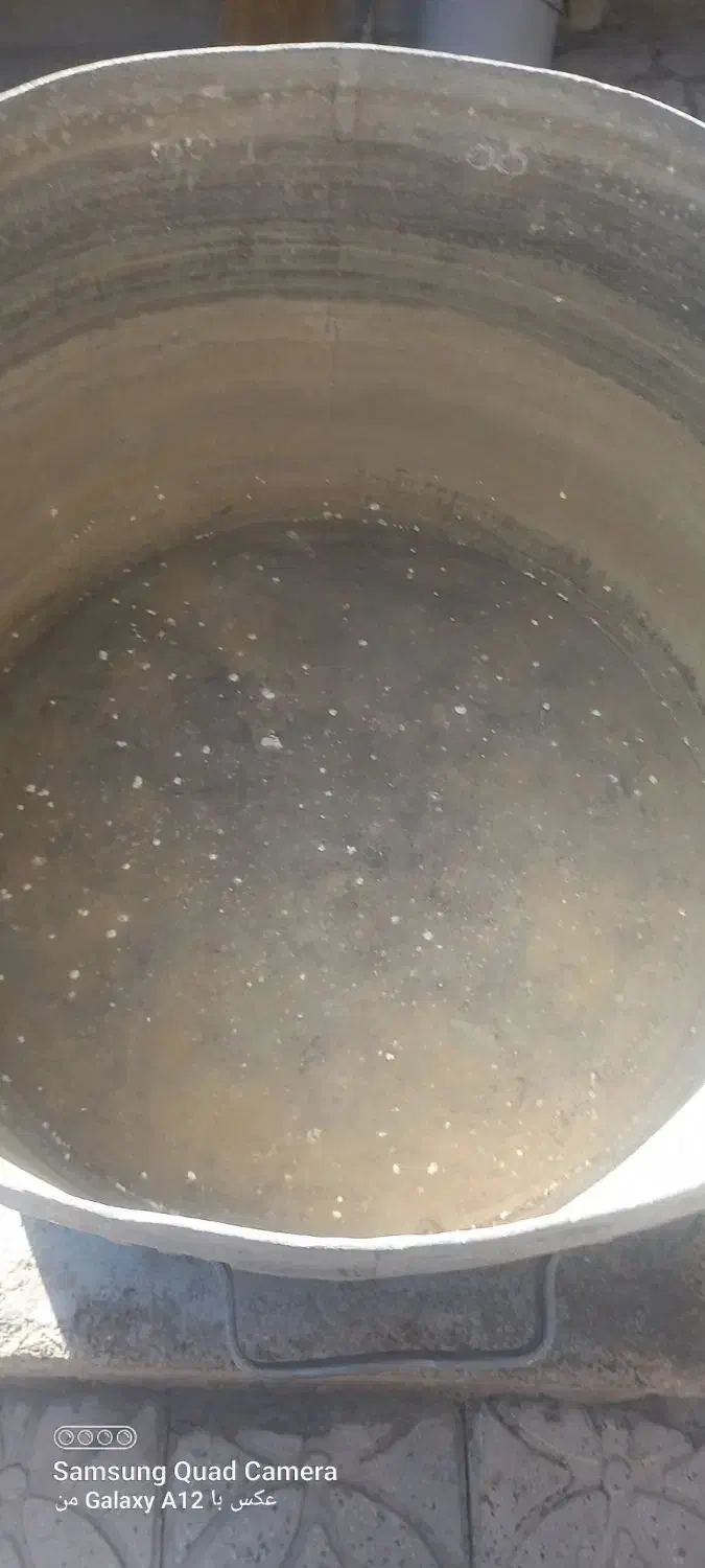 دیک مدنی|ظروف پخت‌وپز|فیروزآباد (فارس), |دیوار