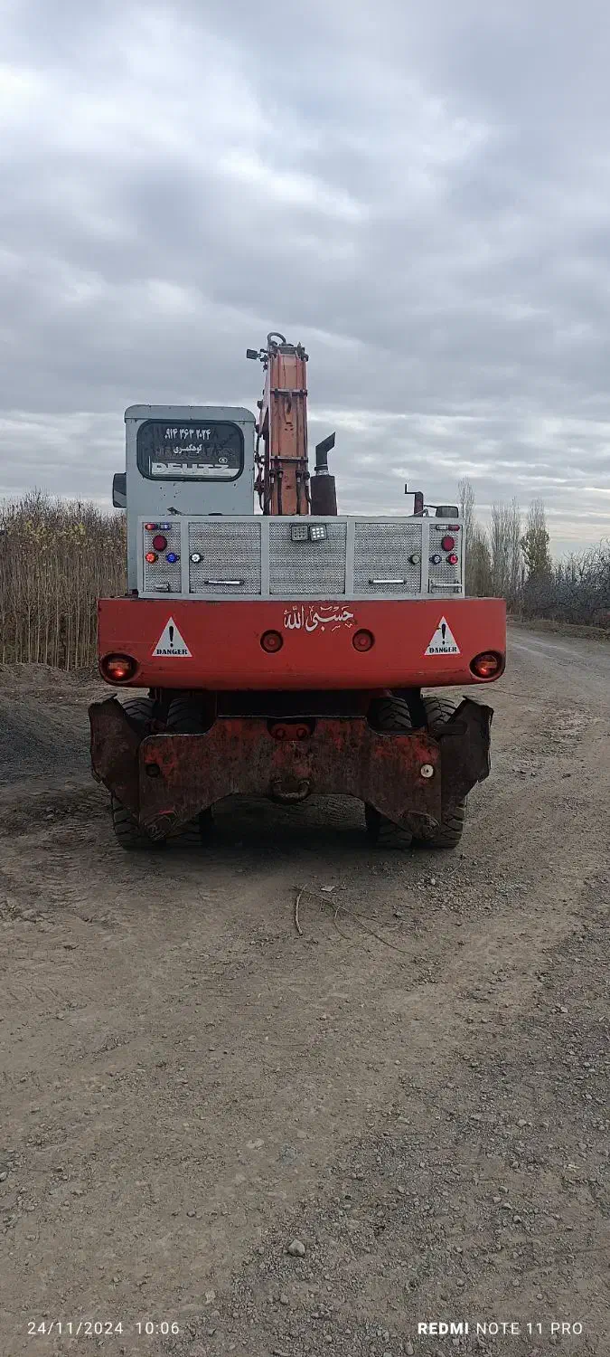 بیل مکانیکی پوکلن|خودرو سنگین|خوی, |دیوار