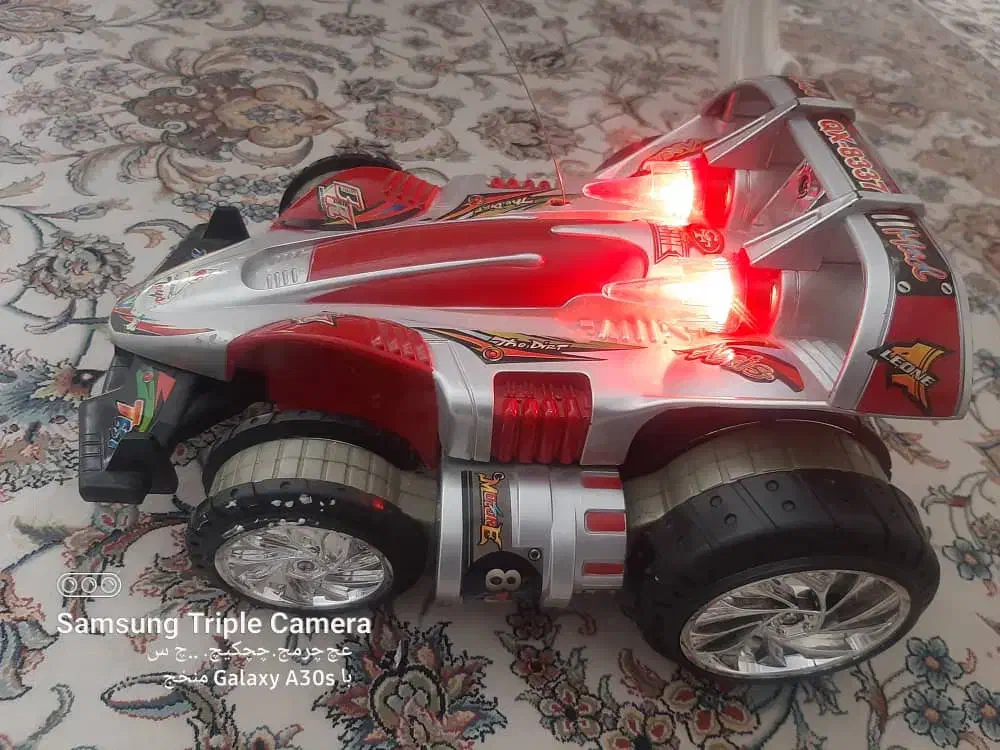 ماشین شارژی۲موتوره کنترل دار آداپتور باطری وغیره|اسباببازی|تهران, تهرانسر غربی|دیوار