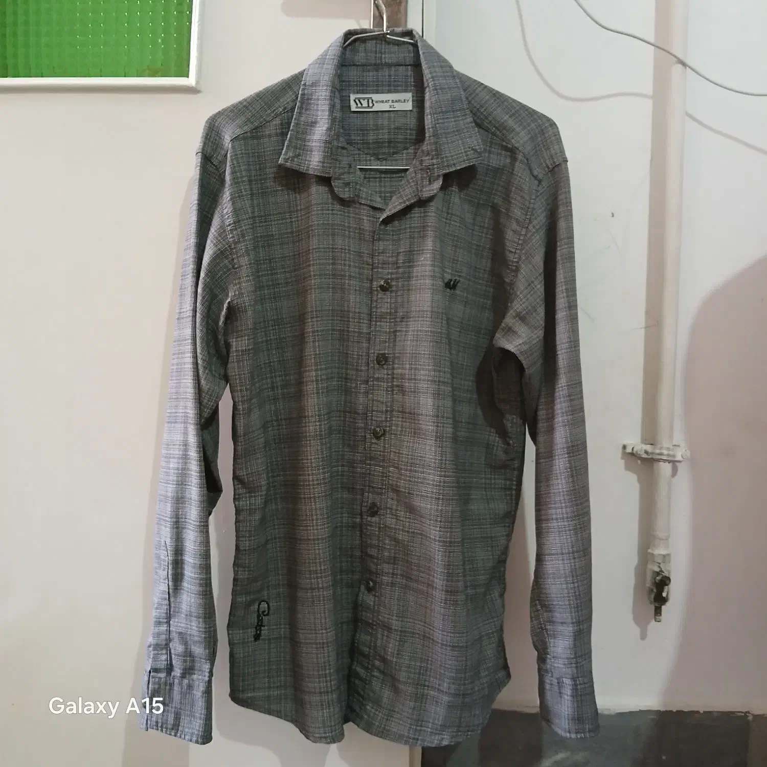 پیراهن مردانه|لباس|قم, باغ شریفی|دیوار