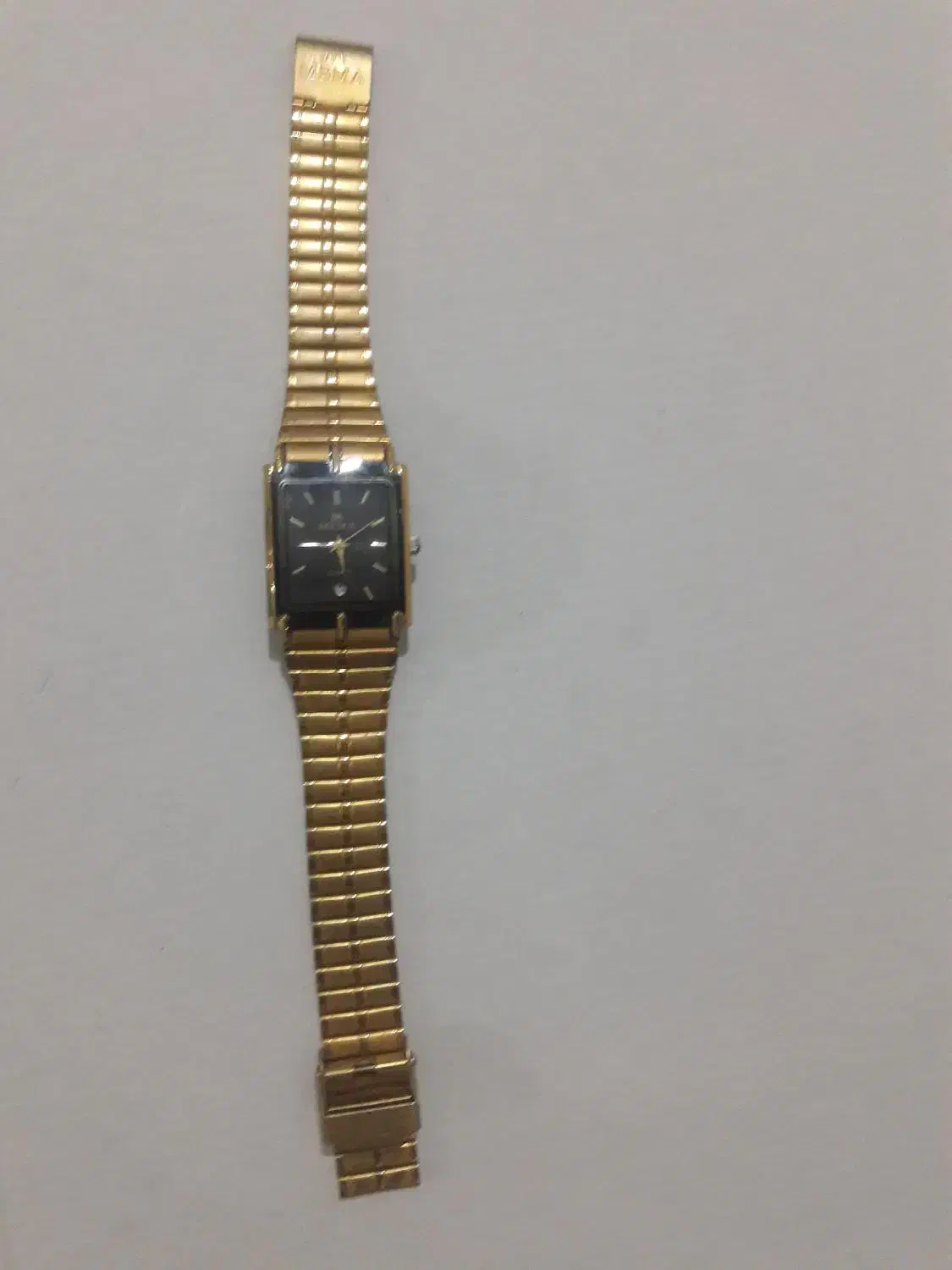 ساعت طلایی|ساعت|تربت جام, میان جام|دیوار