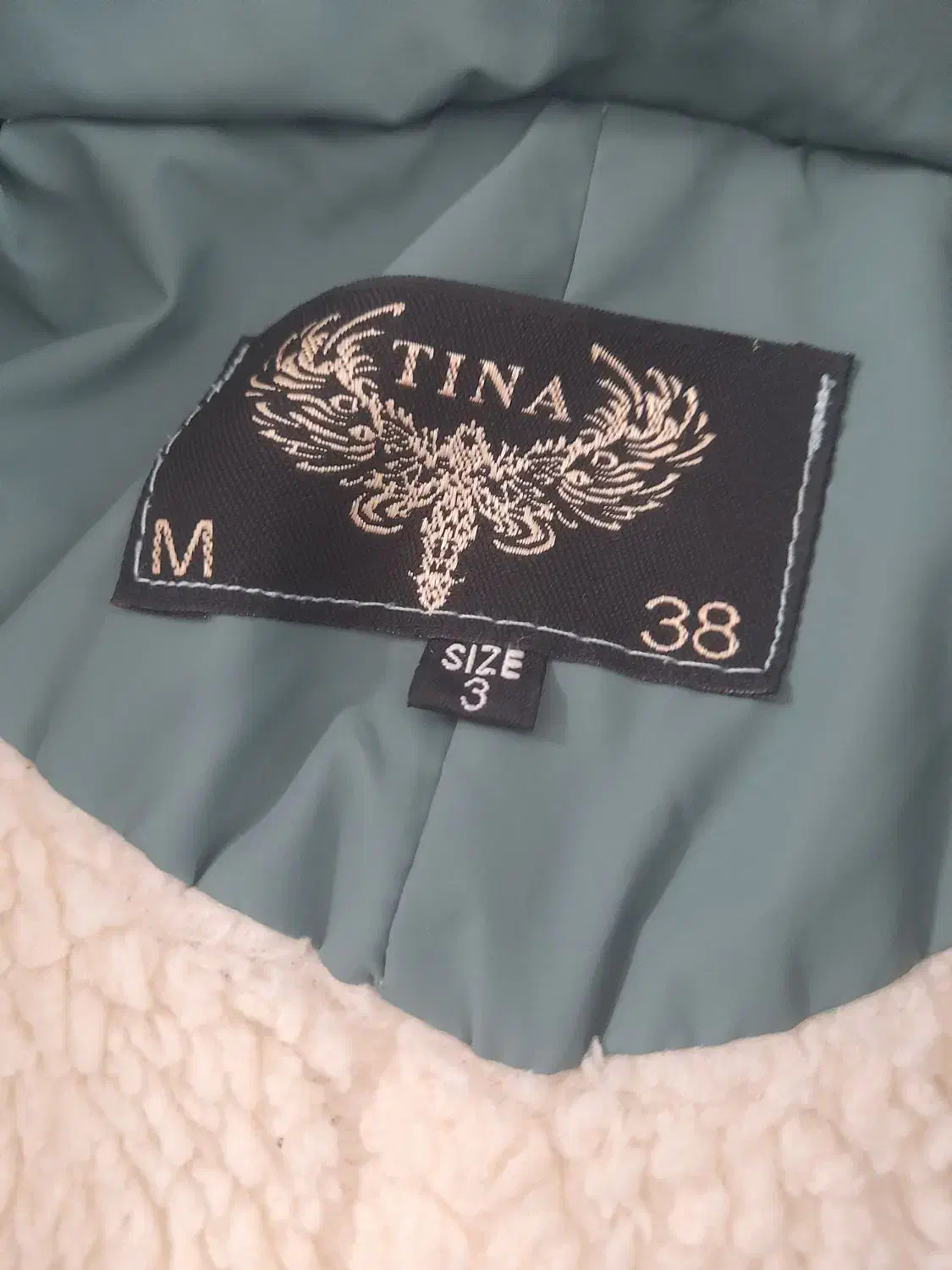 کاپشن|لباس|سنقر, |دیوار