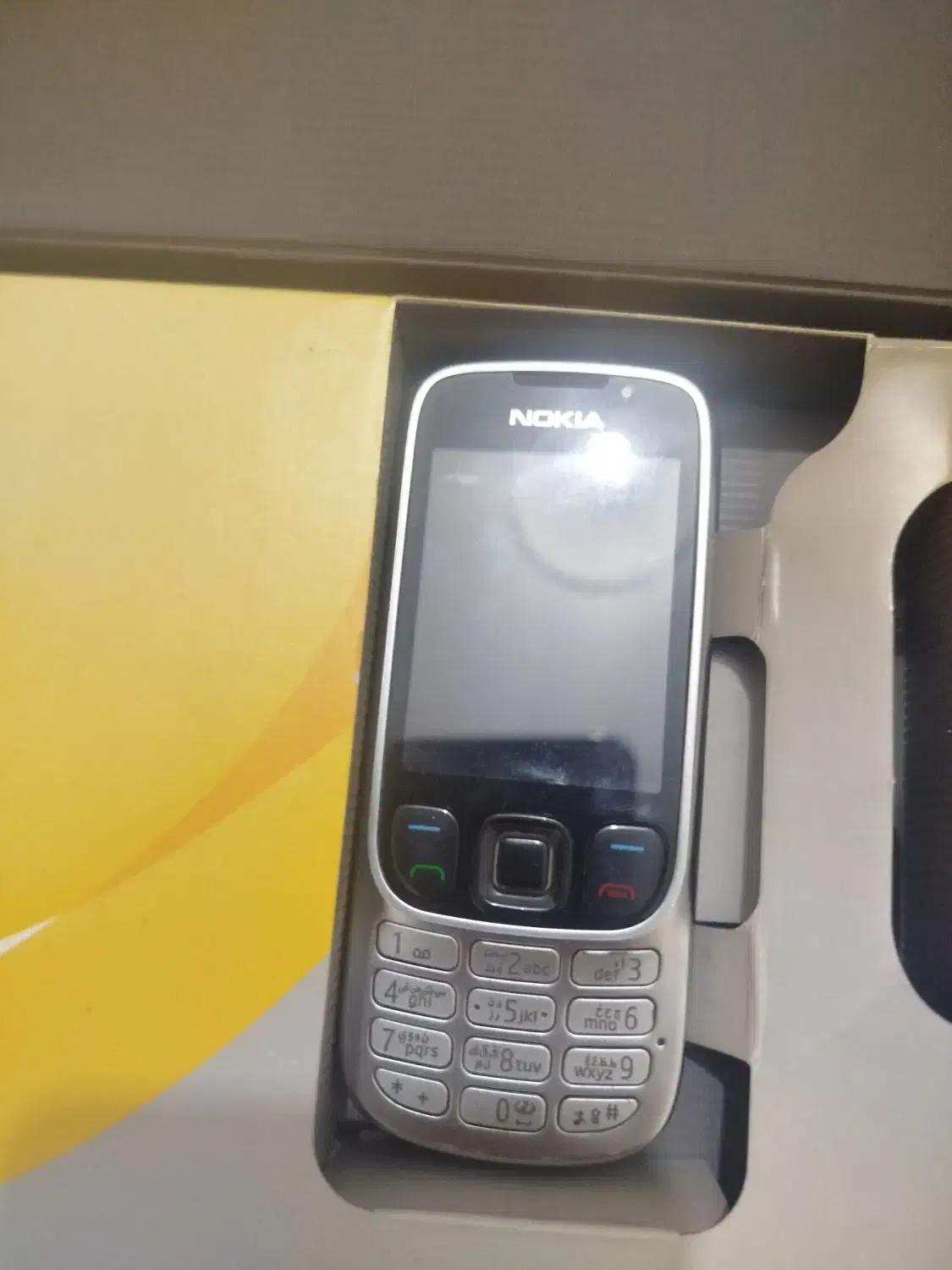 نوکیا ۱۲۰۳ 6303|موبایل|اندیشه, اندیشه فاز ۳|دیوار