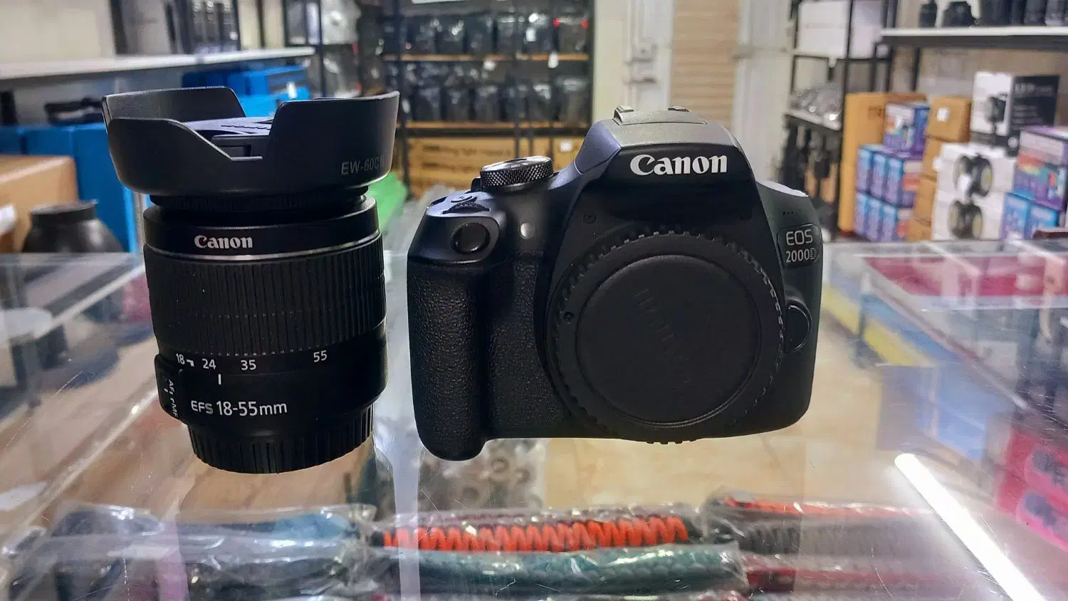 دوربین کنون ۲۰۰۰ دی با لنز ۱۸.۵۵|دوربین عکاسی و فیلم‌برداری|قم, دورشهر|دیوار