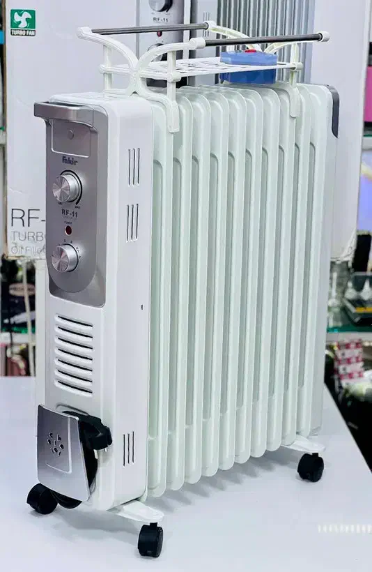 شوفاژ برقی بخاری13پره فن دار پند اصل+یک سال ضمانت|بخاری، هیتر، شومینه|شیراز, میانرود|دیوار