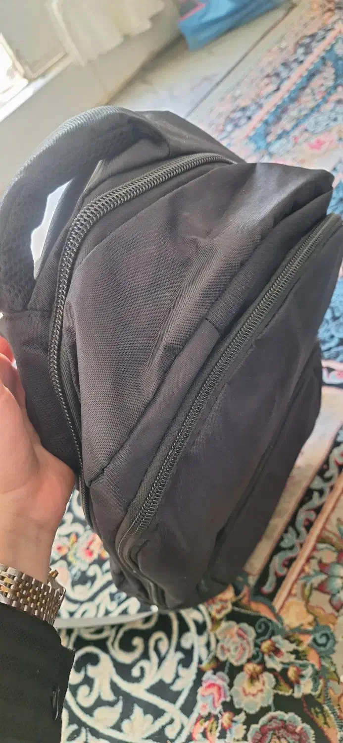 کوله مدرسه|کیف، کفش، کمربند|قم, امامزاده ابراهیم|دیوار