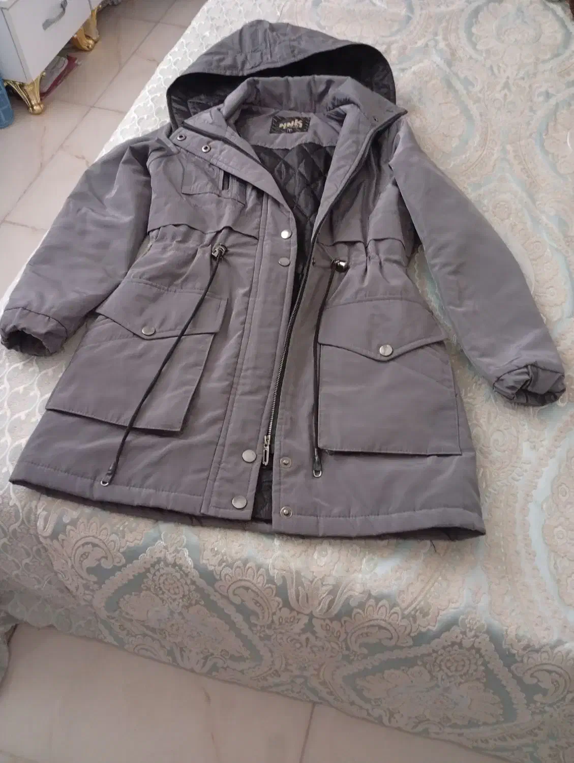 کاپشن|لباس|رشت, کوی مهر|دیوار