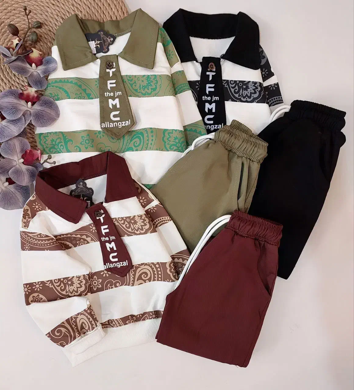 پوشاک کودک|کفش و لباس بچه|قم, قلعه کامکار|دیوار