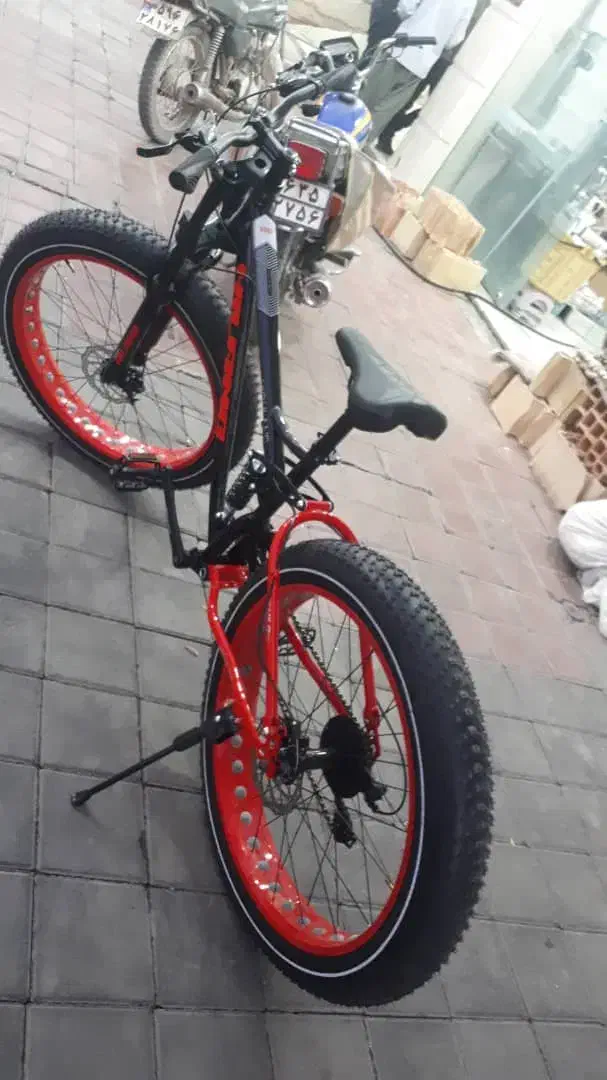 دوچرخه سایز ۲۶ قرمز لاستیک پهن تمیز|دوچرخه، اسکیت، اسکوتر|کاشان, الغدیر|دیوار