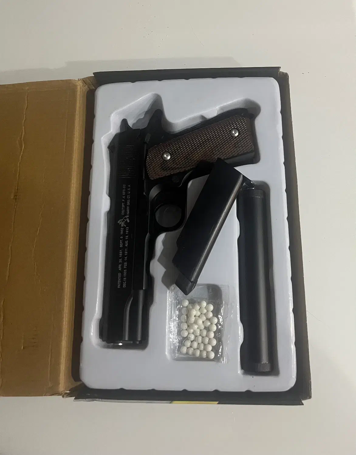 تفنگ کلت بادی|اسباب‌بازی بچه|آمل, |دیوار