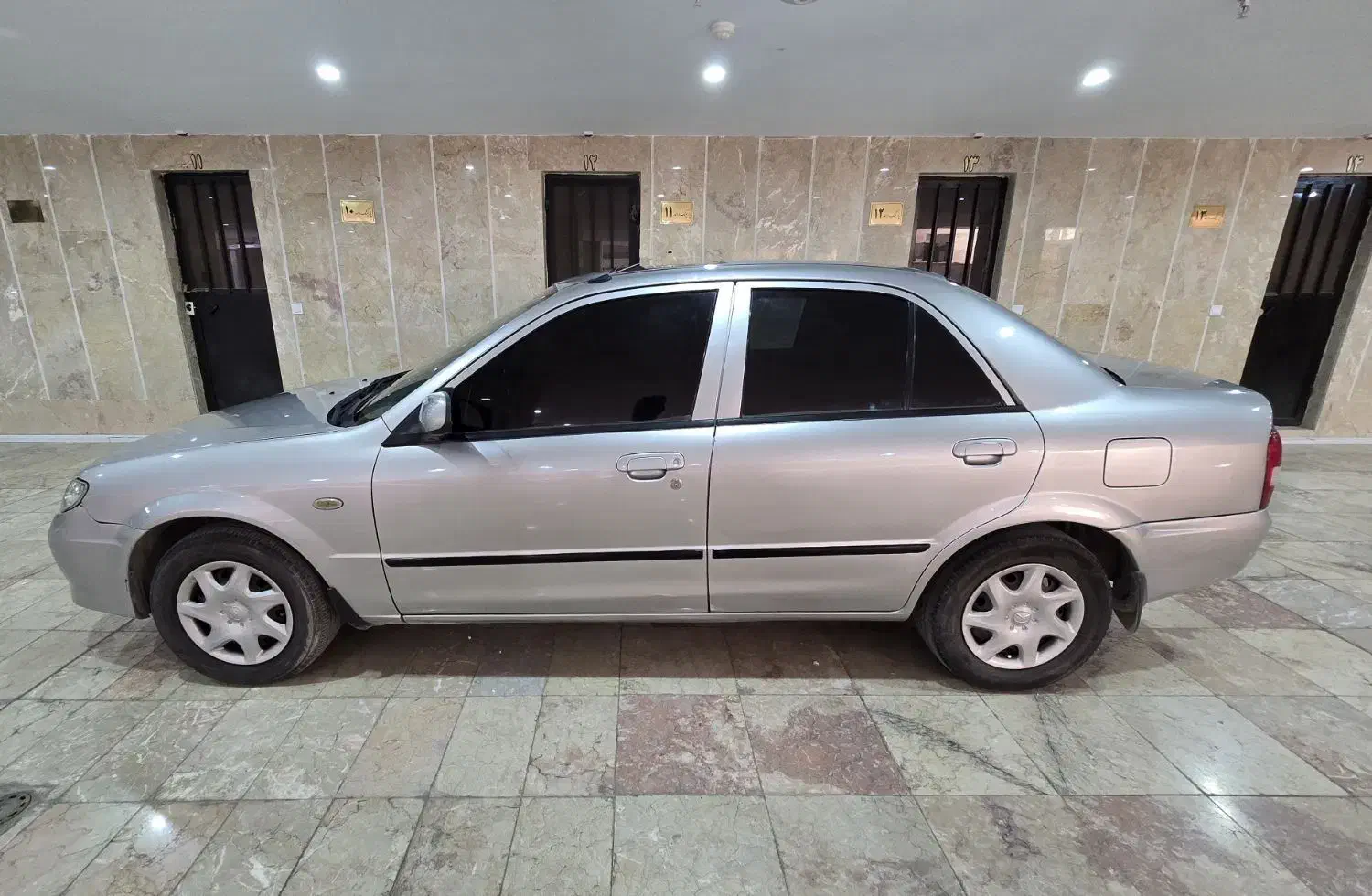 مزدا 323 اتوماتیک FL|خودرو سواری و وانت|پرند, فاز ۰|دیوار