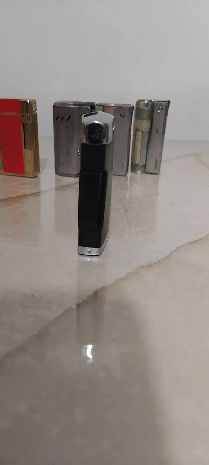 فندک رنسون کومت ساخت انگلستان|کلکسیون اشیاء عتیقه|رشت, توشیبا|دیوار