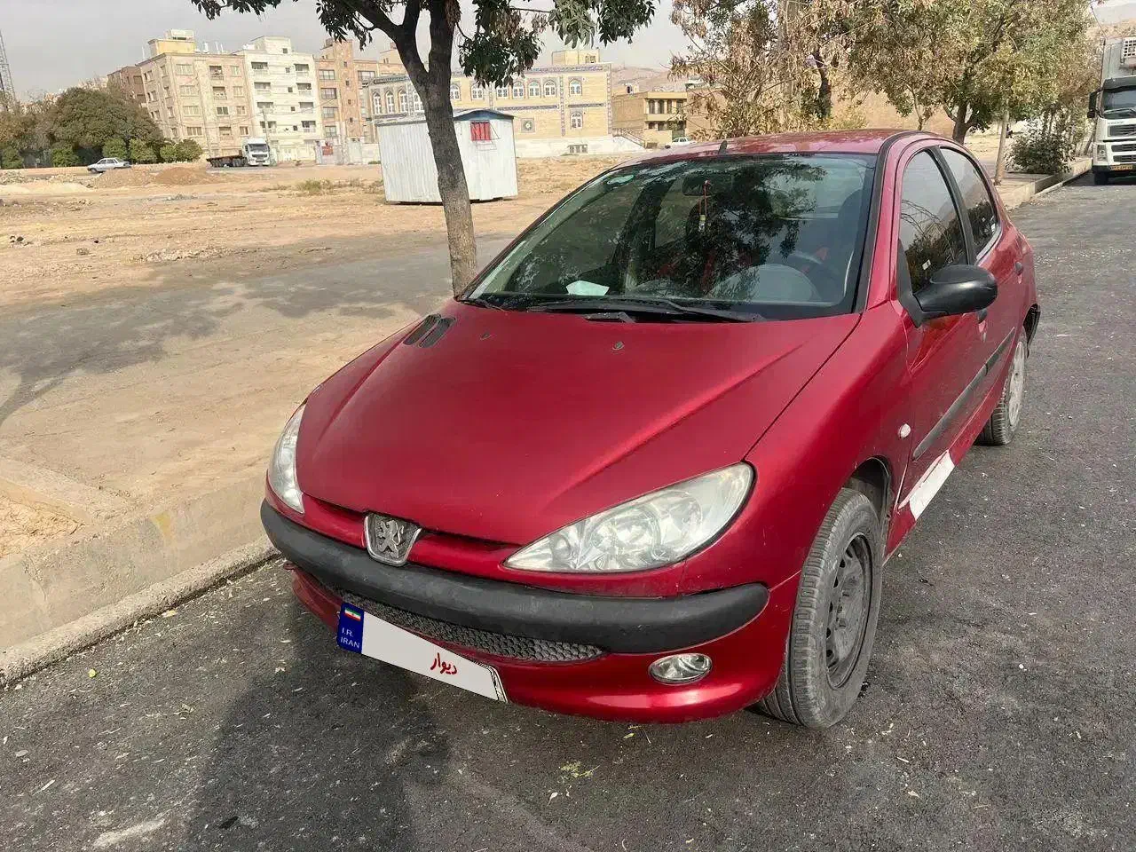 206 آلبالویی مدل 90|خودرو سواری و وانت|شیراز, قالیشویی|دیوار