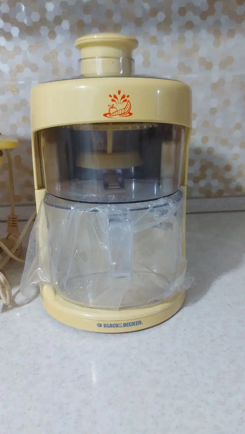 پلوپز و آب میوه گیر|آبمیوه‌گیر و آب‌مرکبات‌گیر|قم, قلعه کامکار|دیوار