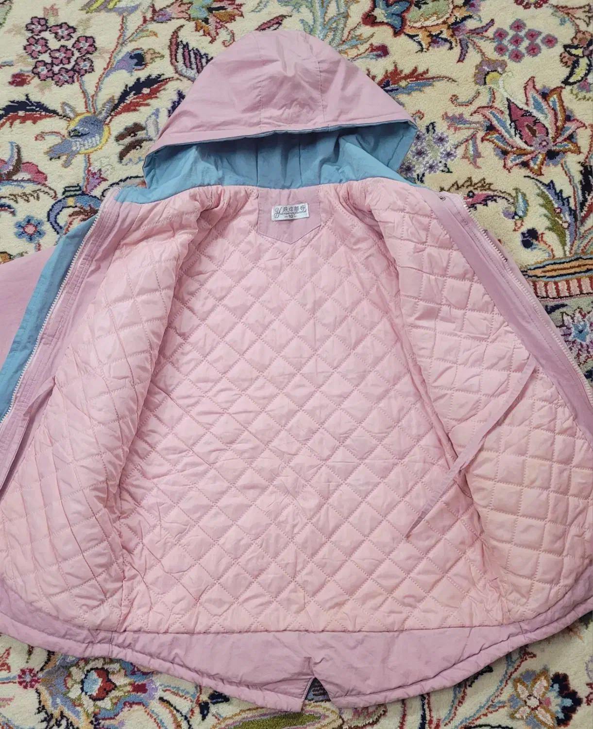 کاپشن خارجی|لباس|تربت‌حیدریه, باغ ملی|دیوار