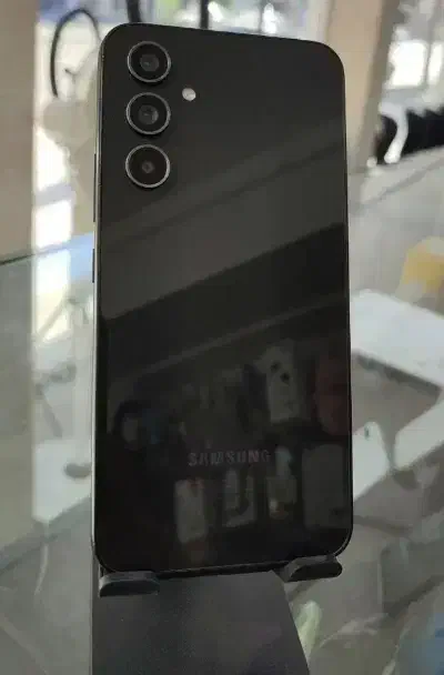 گوشیa54. 5g|موبایل|بافت, |دیوار