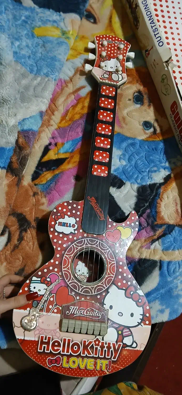 عروسک گیتار و ماشین دیوونه|اسباب‌بازی بچه|خرمشهر, |دیوار