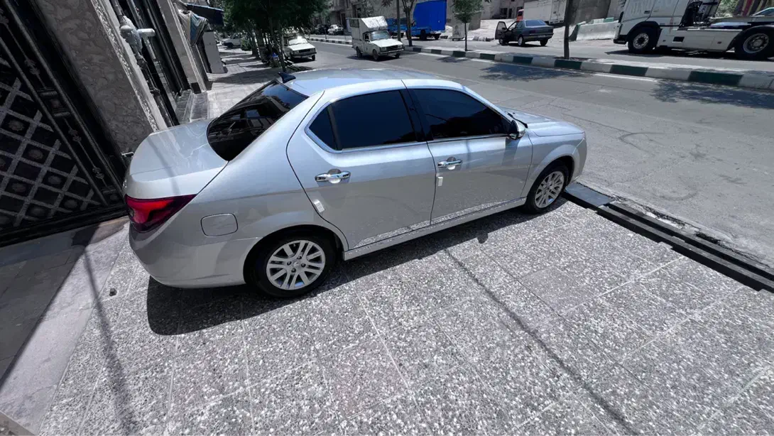 دنا پلاس۱۳۹۹ تیپ۲ چهارچرخ دیسک نقره ای متالیک آپکو|خودرو سواری و وانت|تهران, شهید رجایی|دیوار