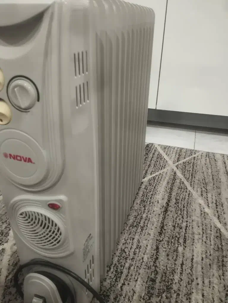 بخاری برقی. شوفاژ و رادیاتور برقی.|بخاری، هیتر، شومینه|محمدیه-قزوین, |دیوار