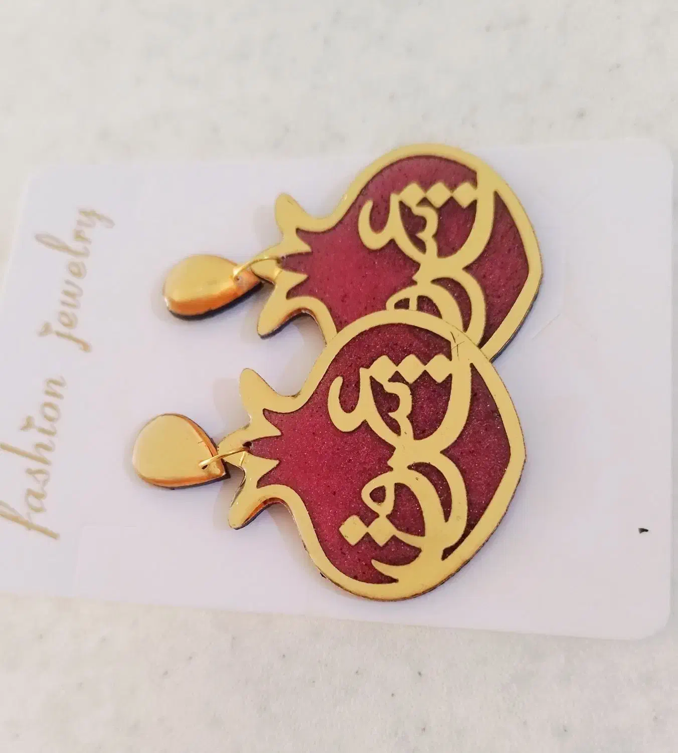 گوشواره رزینی|بدلیجات|بابل, |دیوار