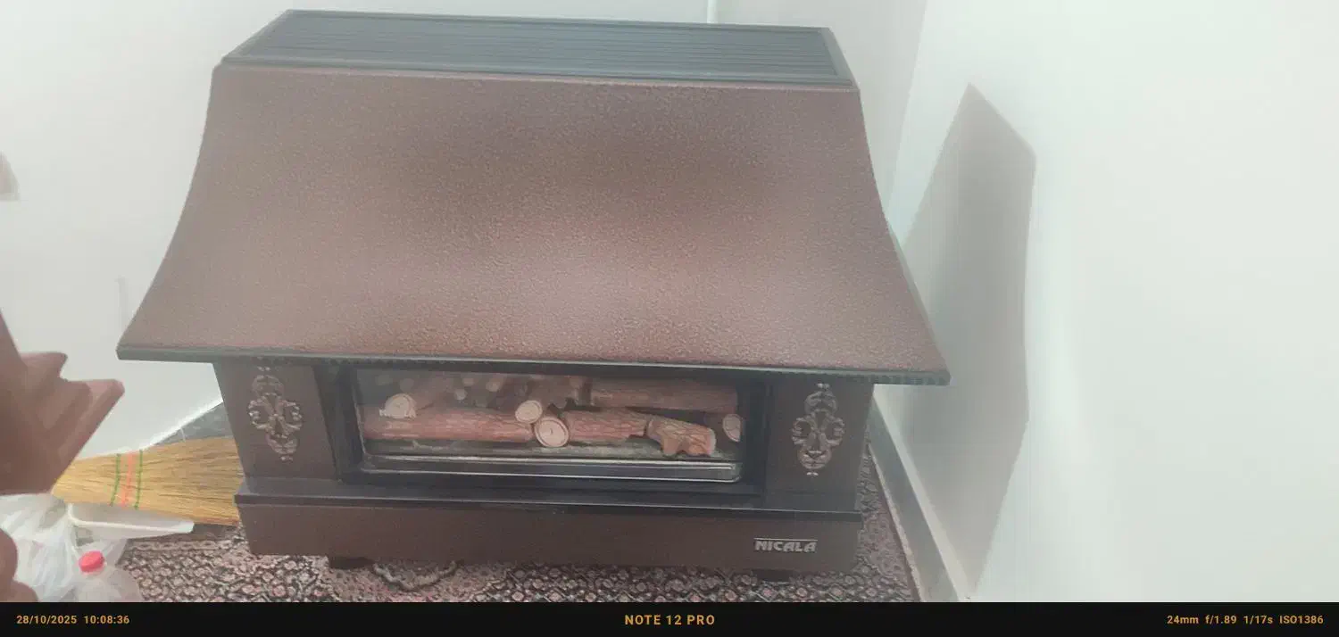 بخاری شومینه ای در حد اکبند|بخاری، هیتر، شومینه|اردبیل, |دیوار