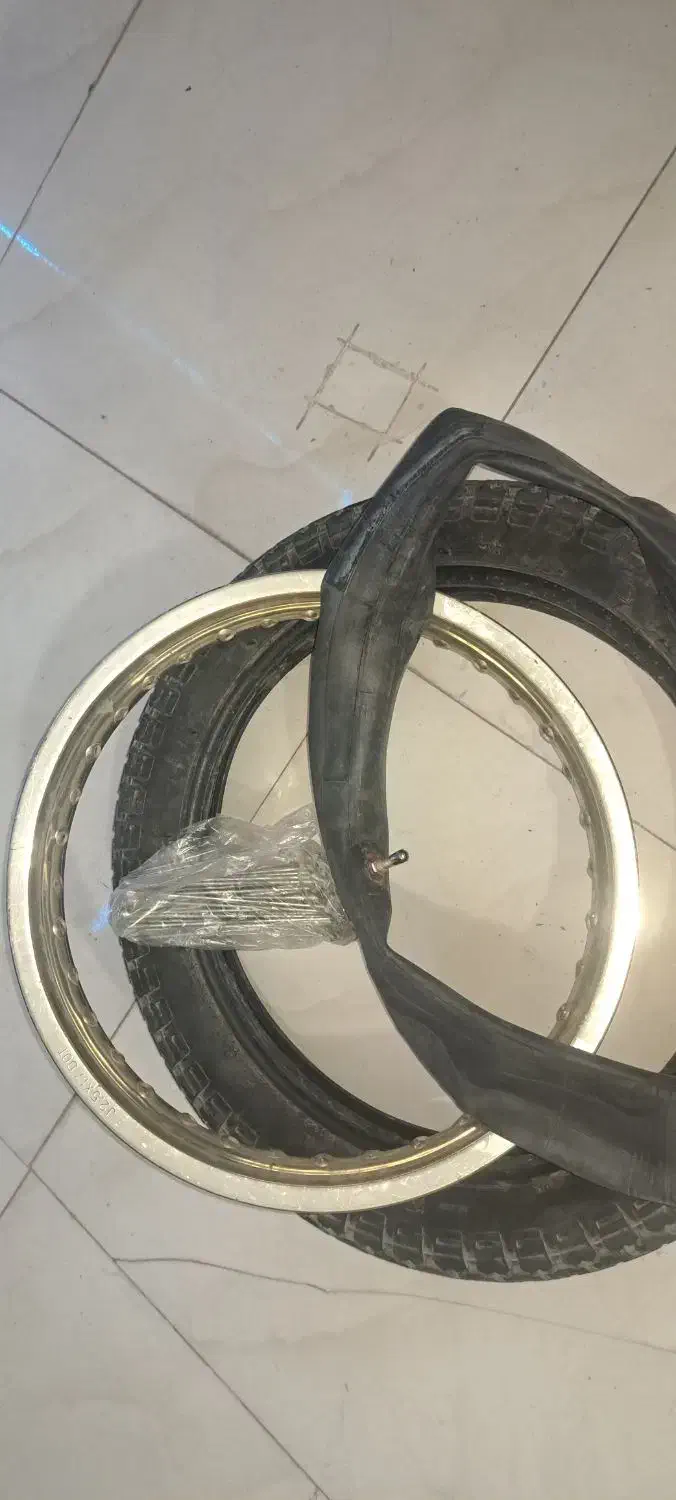طوقه ۱۷ تریل با تیوب لاستیک پره کامل|قطعات یدکی و لوازم جانبی|هشتگرد, گلسار|دیوار