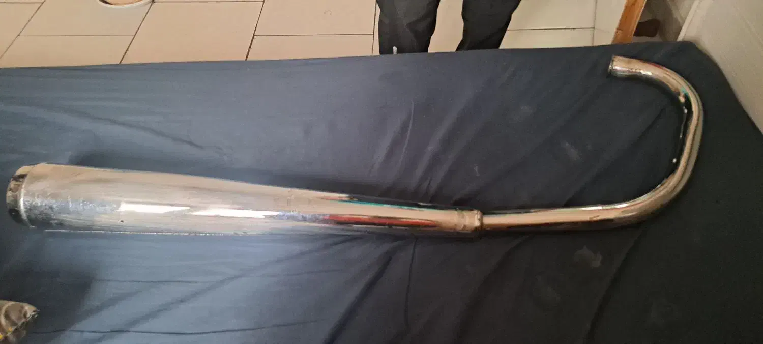 اگزوز موتور ۱۲۵|قطعات یدکی و لوازم جانبی|پرند, فاز ۴|دیوار