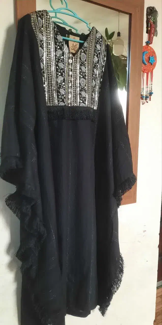 عبا|لباس|شاهین‌شهر, خانه کارگر|دیوار