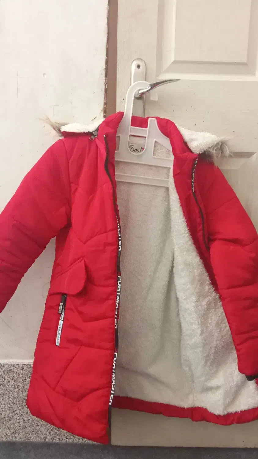 کاپشن|لباس|مشهد, شهید آوینی|دیوار