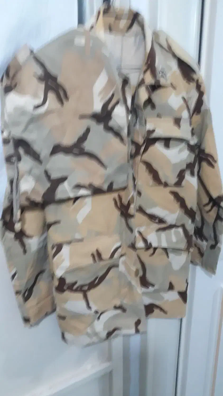 لباس و کوله نظامی|لباس|قم, قلعه عموحسین|دیوار