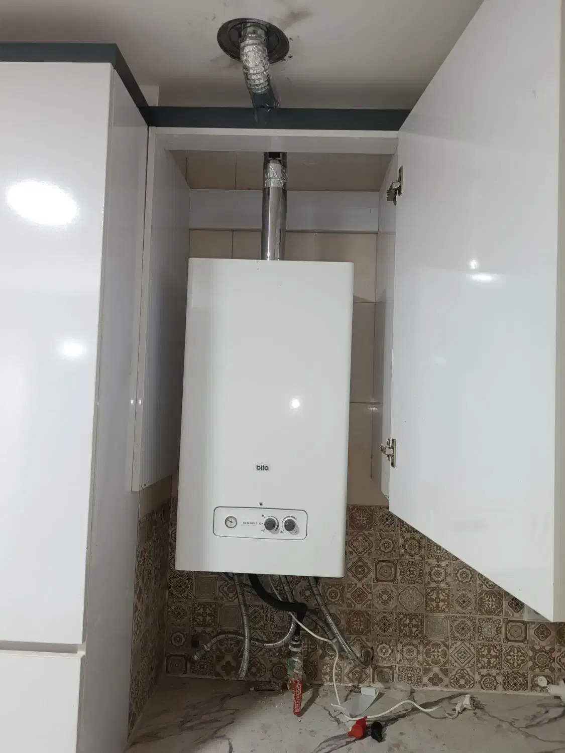 نمایندگی پکیج ایران رادیاتور ،بوتان|آبگرمکن، پکیج، شوفاژ|صدرا-فارس, فاز ۱|دیوار