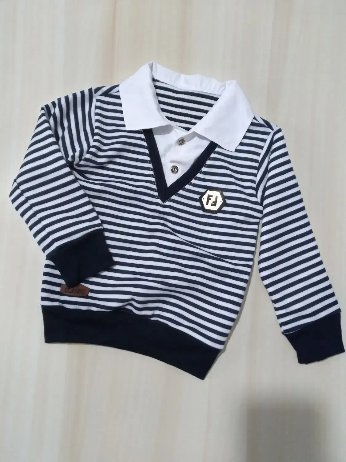 پسرانه ودخترانه|کفش و لباس بچه|رباطکریم, رباطکریم|دیوار