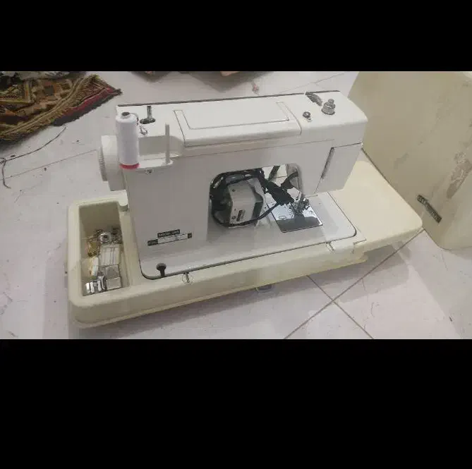 چرخ خیاطی ژانومه|چرخ خیاطی و ریسندگی|صدرا-فارس, فاز ۱|دیوار