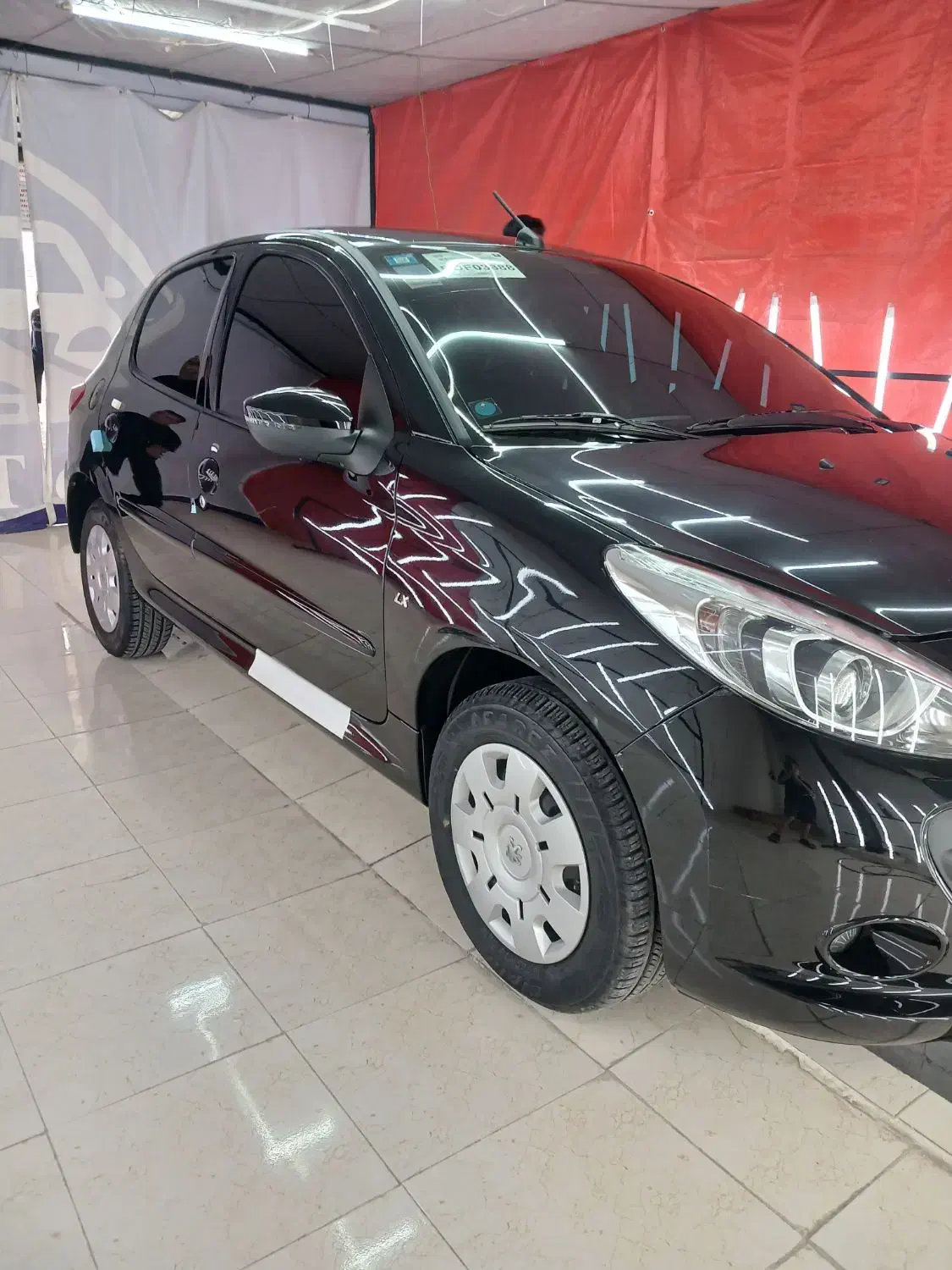 ۲۰۷ مشکی سقف فلز  تیوفایو در حد صفر|خودرو سواری و وانت|شیراز, پودنک|دیوار