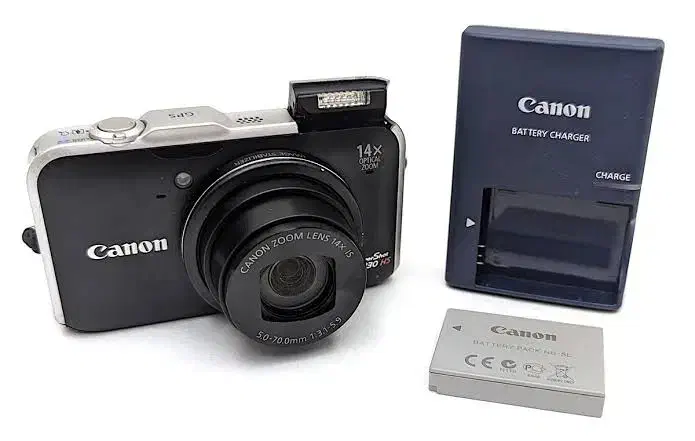 دوربین کنون|دوربین عکاسی و فیلم‌برداری|قیروکارزین, |دیوار