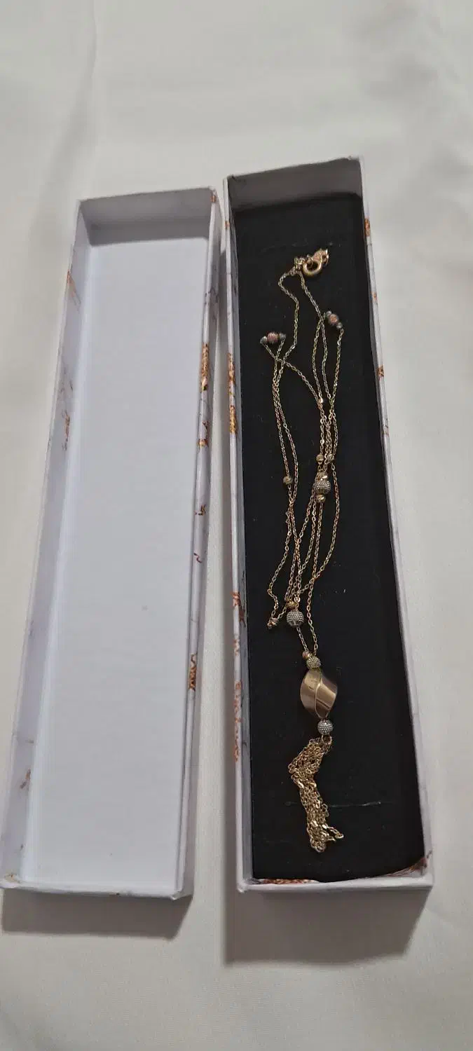 ۷گرم و۸۴۰ سوت طلا نو نو|جواهرات|قروه, |دیوار